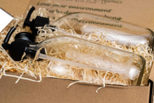 Load image into Gallery viewer, Nomara Organics® Giraffe Clear Glass Soap & Lotion Dispenser 2 x 300 ml set. Set is Laser Engraved with Giraffe motifs, fitted with BPA-free Lockable pumps & Non-leak lids/caps.
