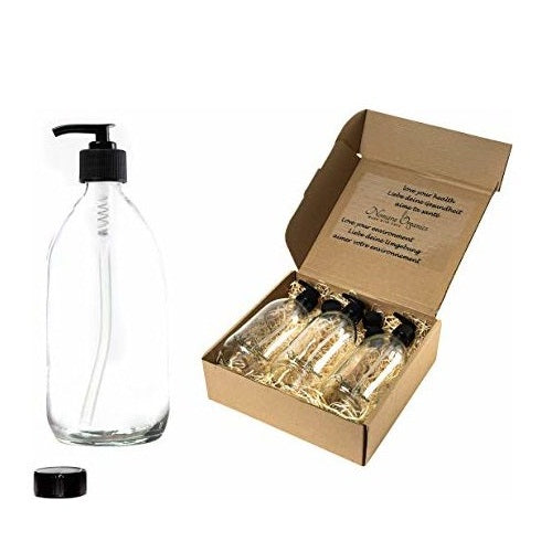 Boxed 4pcs Clear Glass Lotion & Soap Dispenser set 300ml by Nomara Organics®. Nestled in a box of straw, fitted with BPA-free Lockable Pumps, 4 Spare Non-leak caps, Reusable, ideal for a gift, Handwash, Organic products, Travel, DIY, Arts & Crafts.